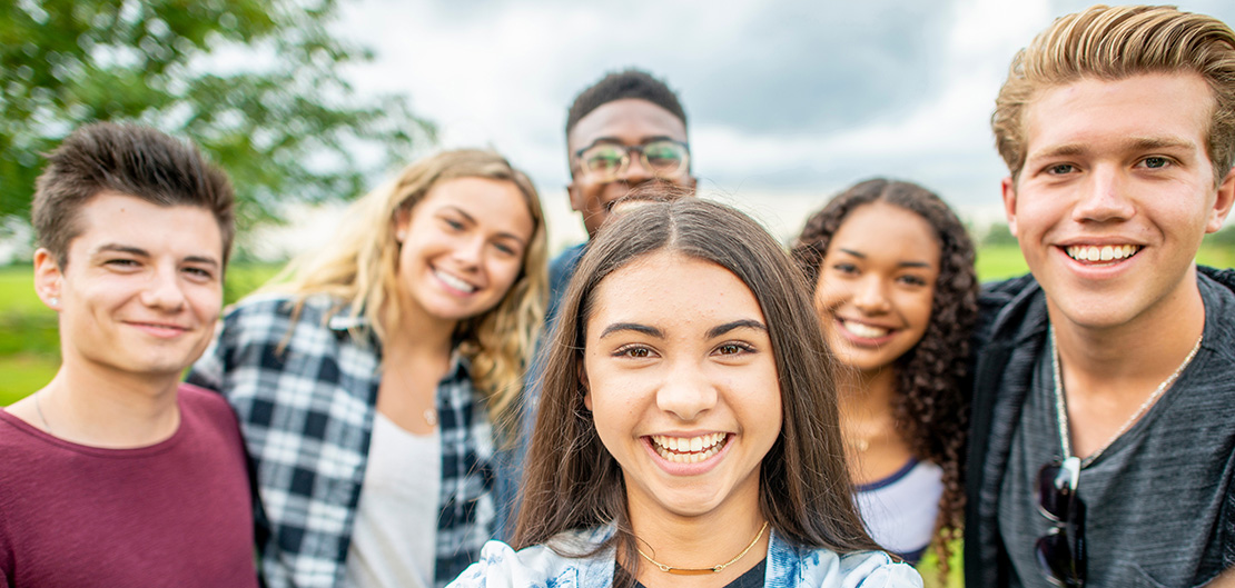 Image of group of smiling teenagers