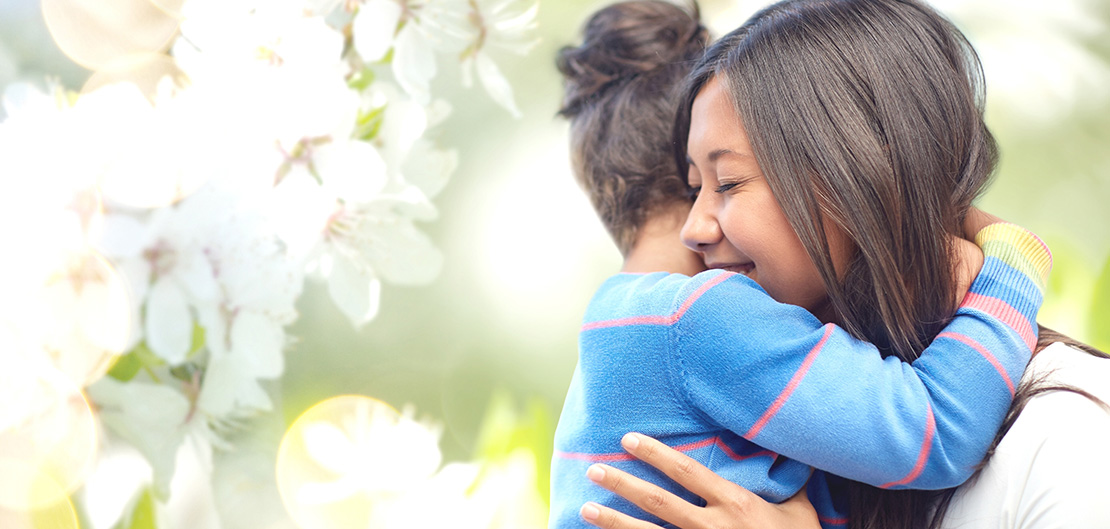 Image of mother hugging her child