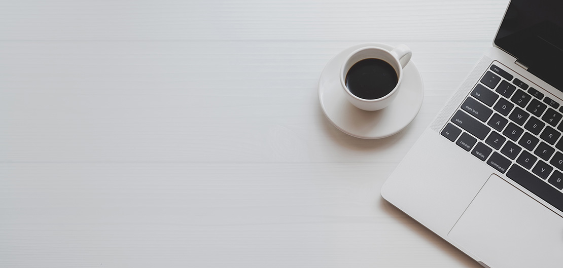 Image of laptop and coffee